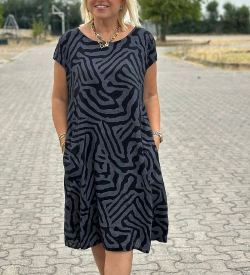 Nelia| Vasaras kleita ar apaļu kakla izgriezumu un skaistu apdruku sievietēm